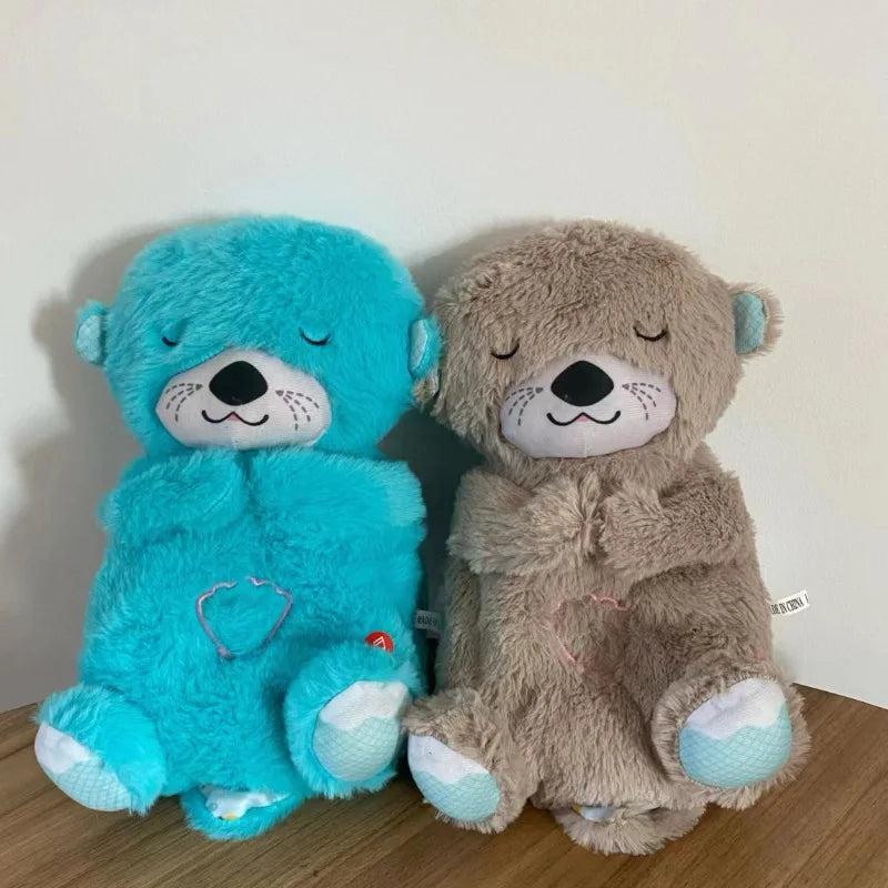 doudou loutre qui respire bleu et gris
