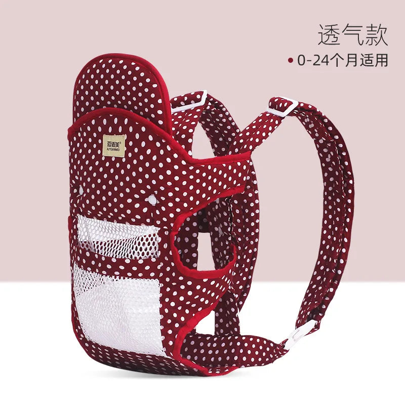 porte bébé rouge avec taches